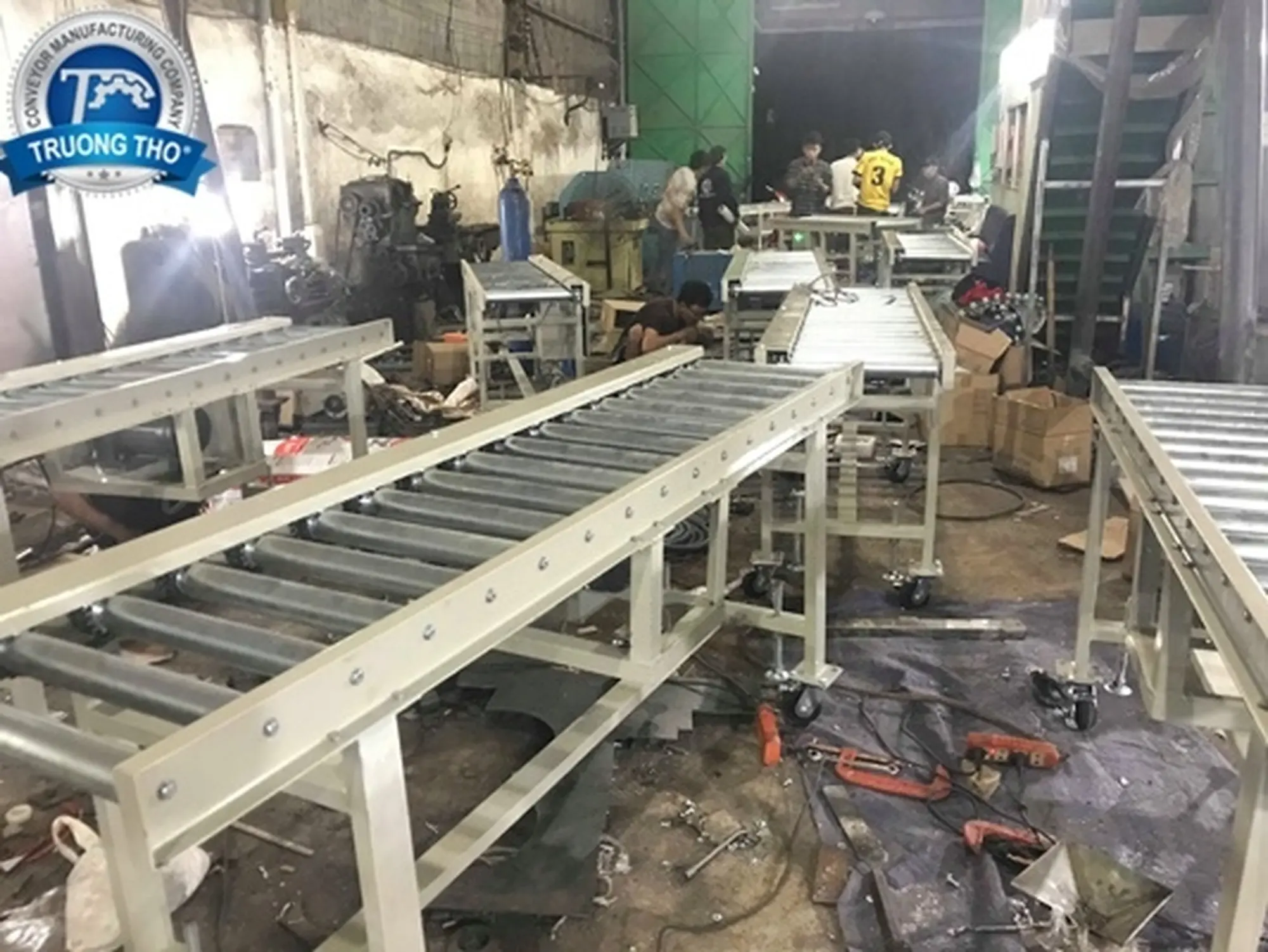 Băng tải con lăn truyền động xích 24 mét
